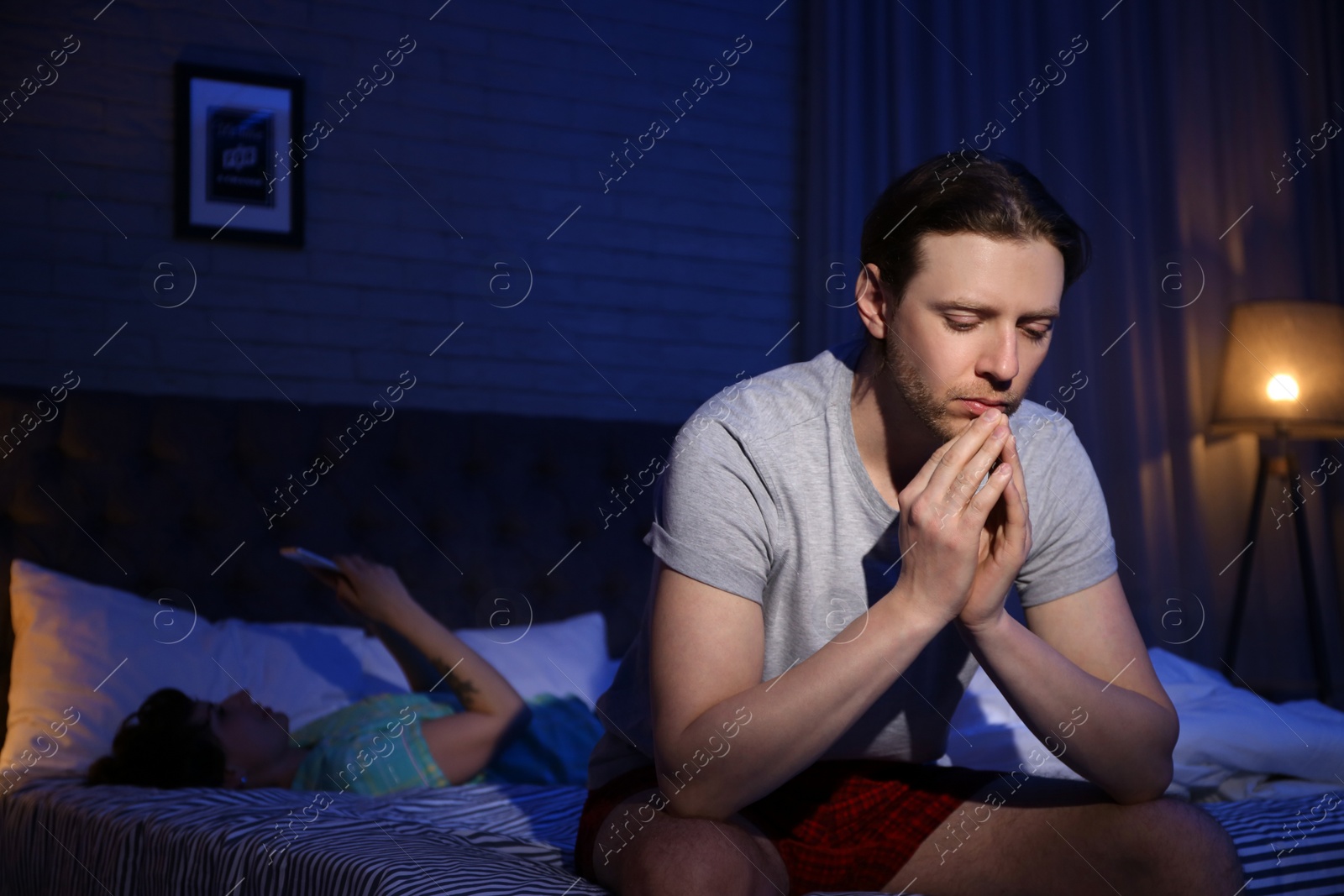 Photo of Young couple with relationship problem at home