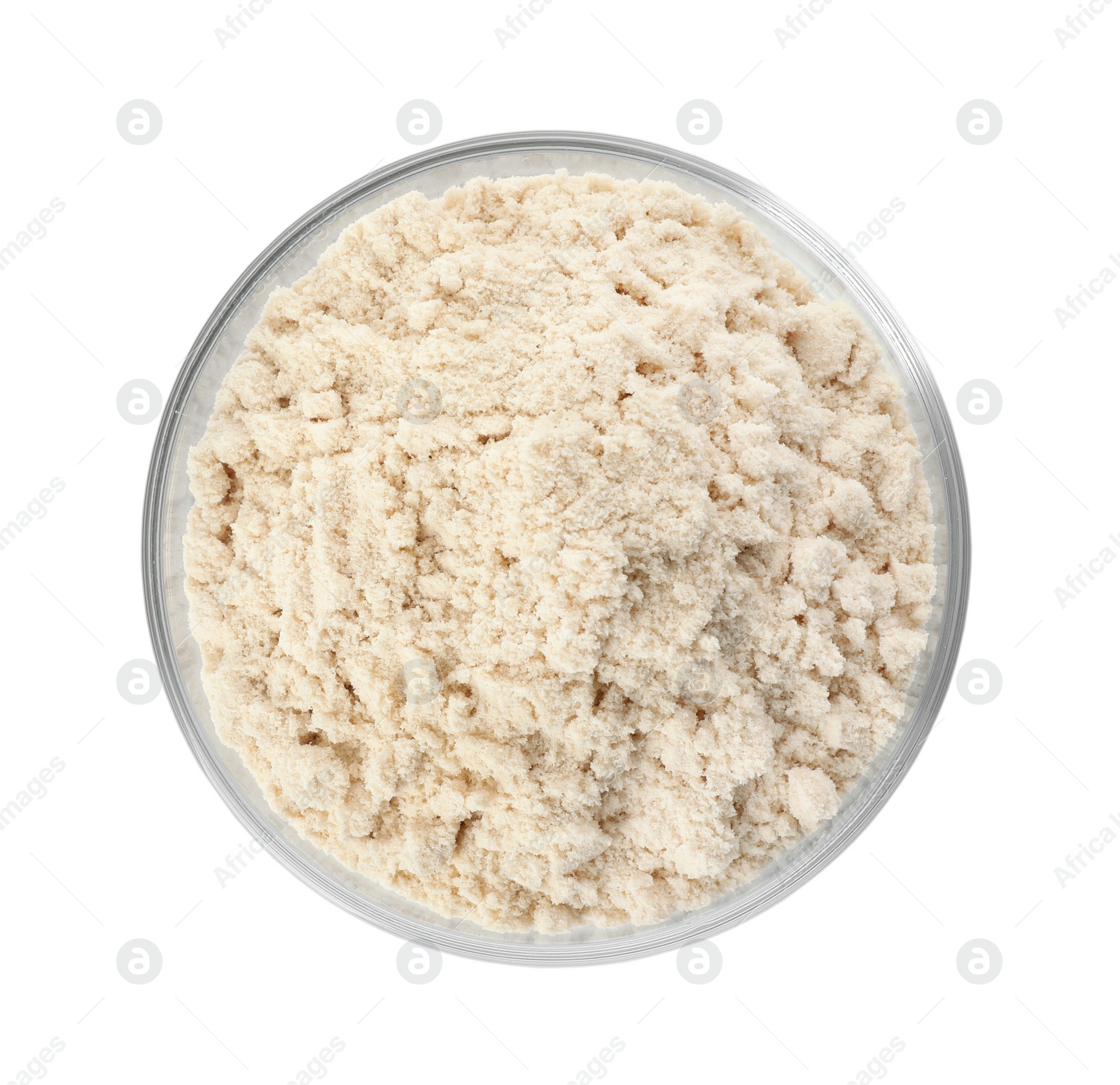 Photo of Bowl of sesame flour isolated on white, top view