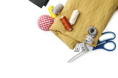 Photo of Set of different sewing accessories on white background, top view