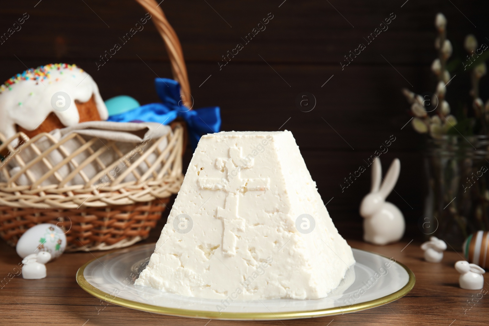 Photo of Traditional cottage cheese Easter paskha on wooden table