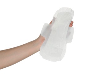 Photo of Woman holding sanitary napkin on white background, closeup