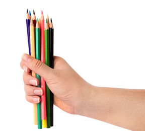 Woman holding bunch of color pencils on white background, closeup