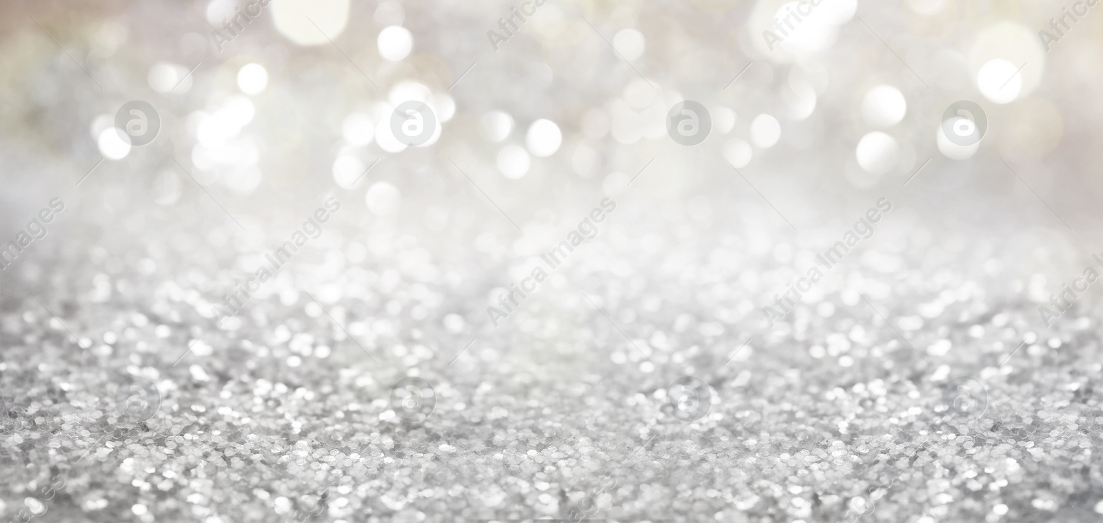 Image of Shiny silver glitter as background. Banner design