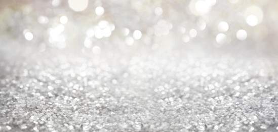 Image of Shiny silver glitter as background. Banner design