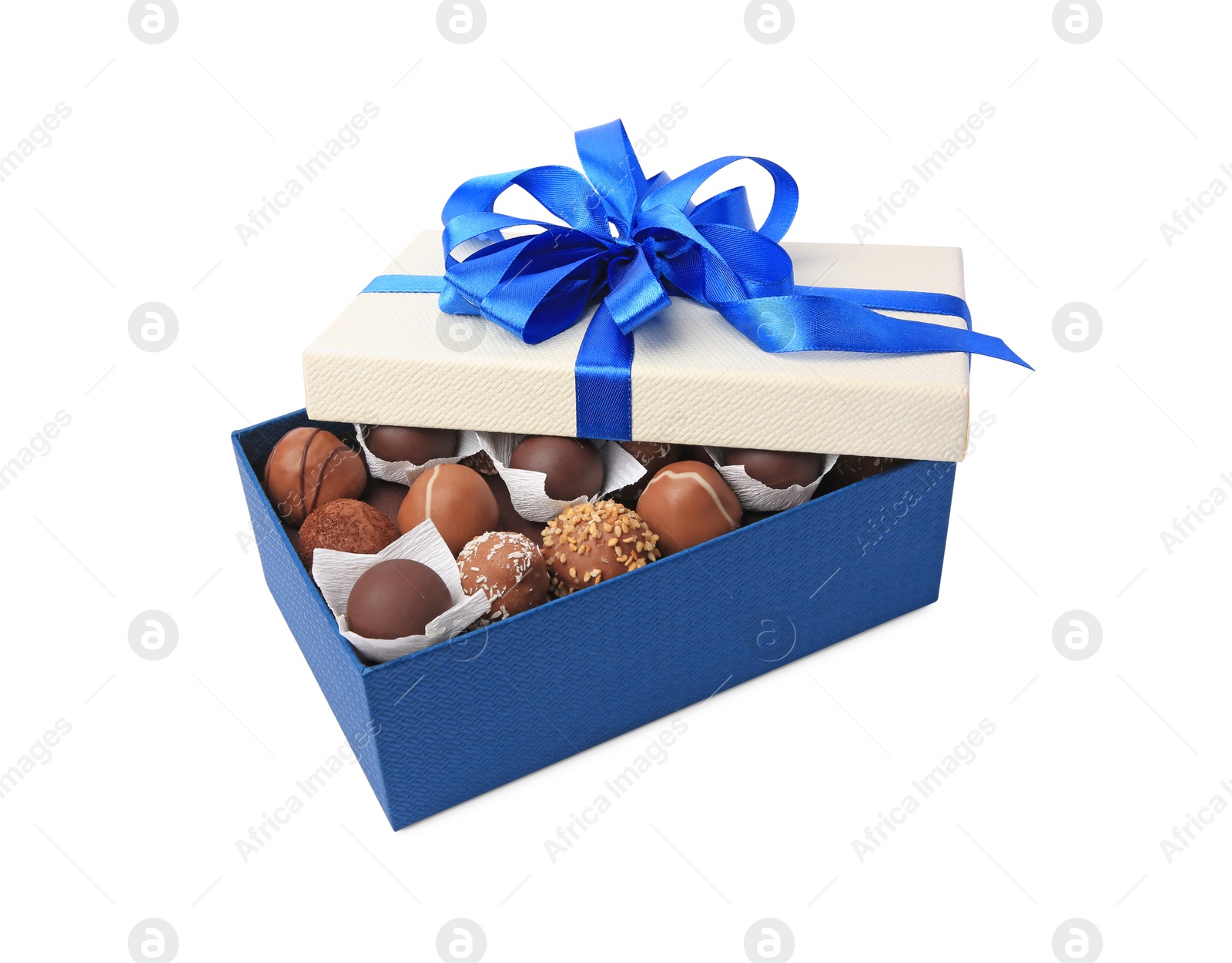 Photo of Box with delicious chocolate candies isolated on white