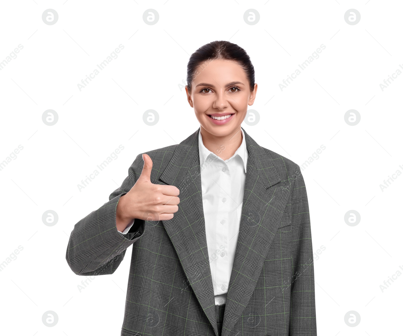 Photo of Beautiful happy businesswoman in suit showing thumbs up on white background