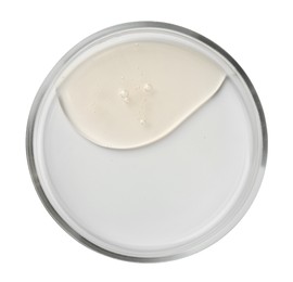 Petri dish with color liquid sample on white background, top view