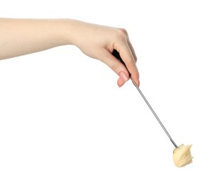 Photo of Tasty fondue. Woman holding fork with piece of pear and melted cheese on white background, closeup