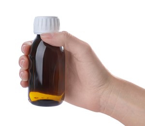 Photo of Woman holding bottle of syrup isolated on white, closeup. Cough and cold medicine