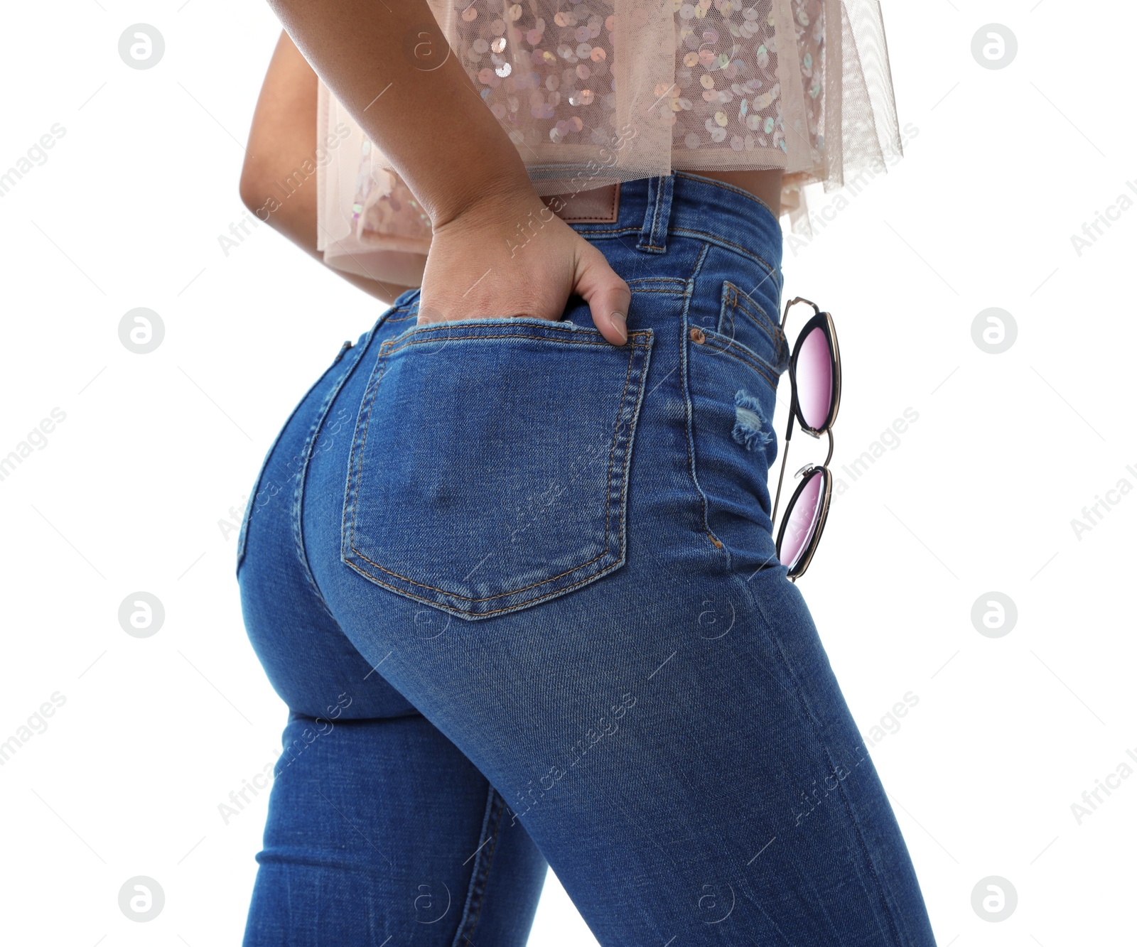 Photo of Woman wearing jeans on white background, closeup