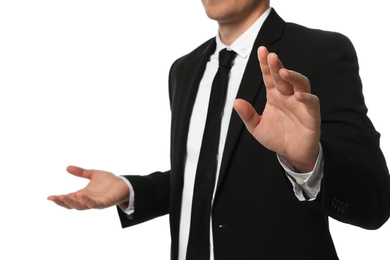 Photo of Businessman touching something on white background, closeup