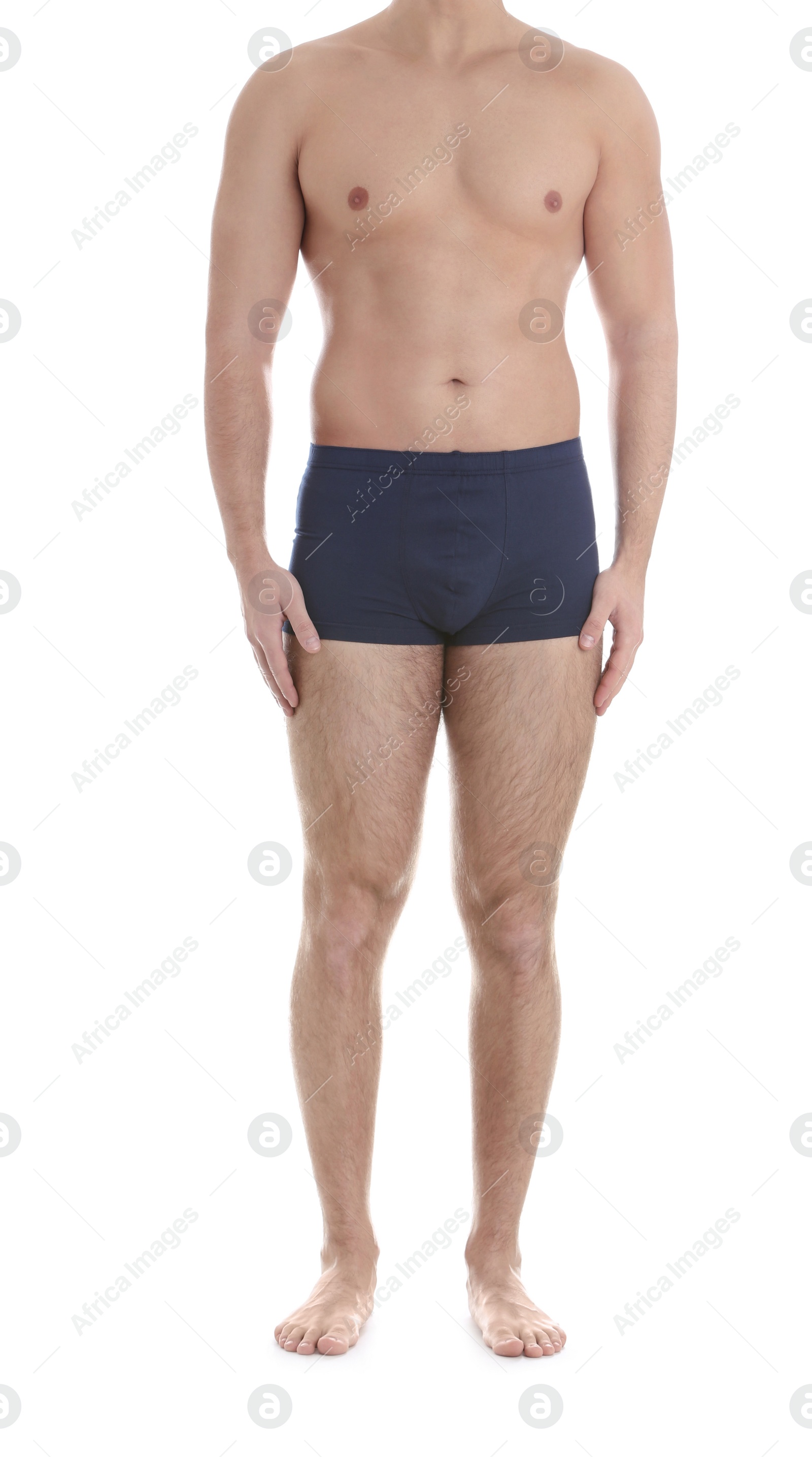 Photo of Young athletic man on white background, closeup. Weight loss