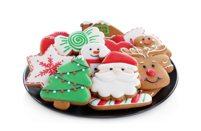 Delicious gingerbread Christmas cookies on white background