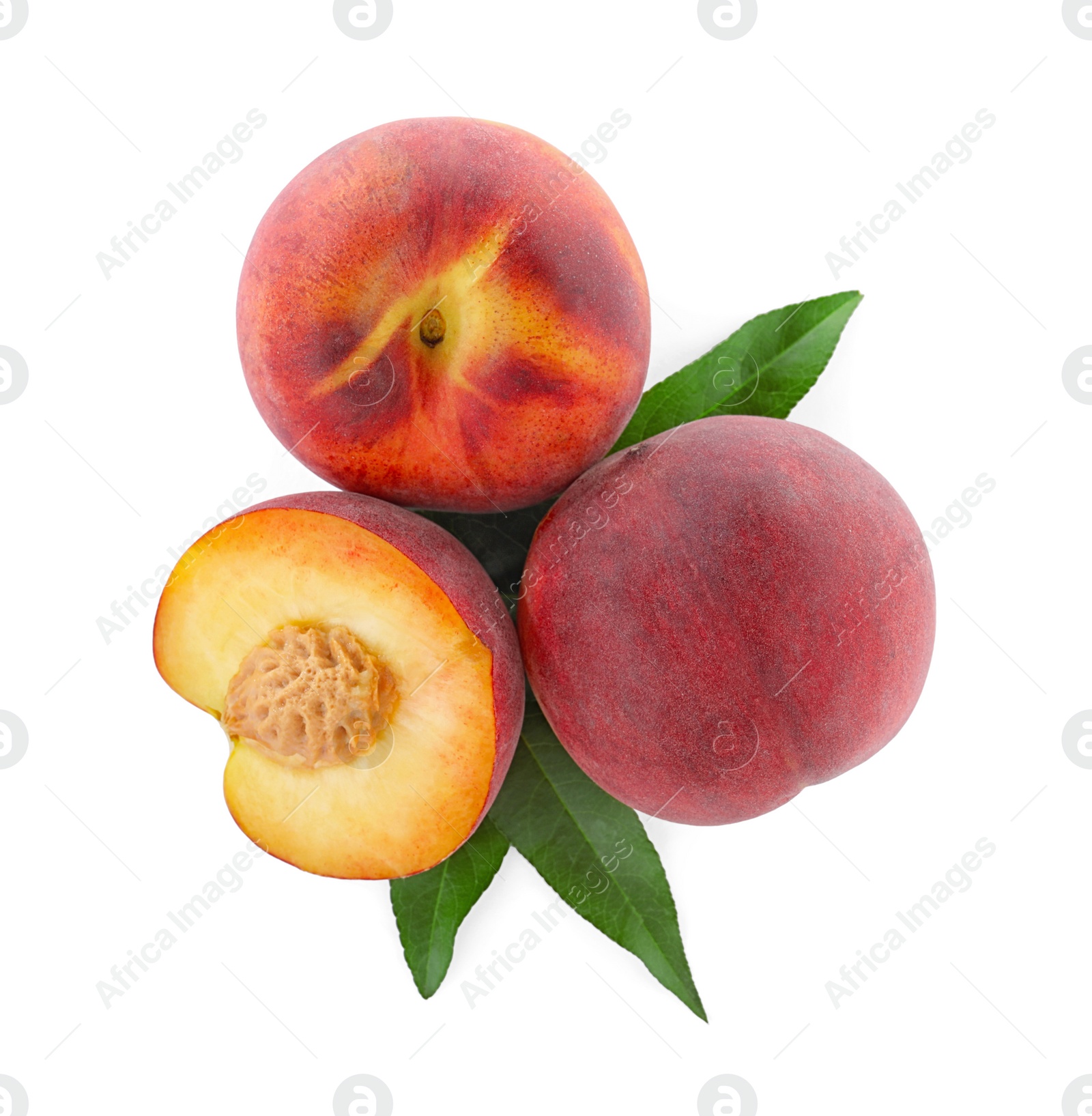 Photo of Sweet juicy peaches with leaves on white background, top view