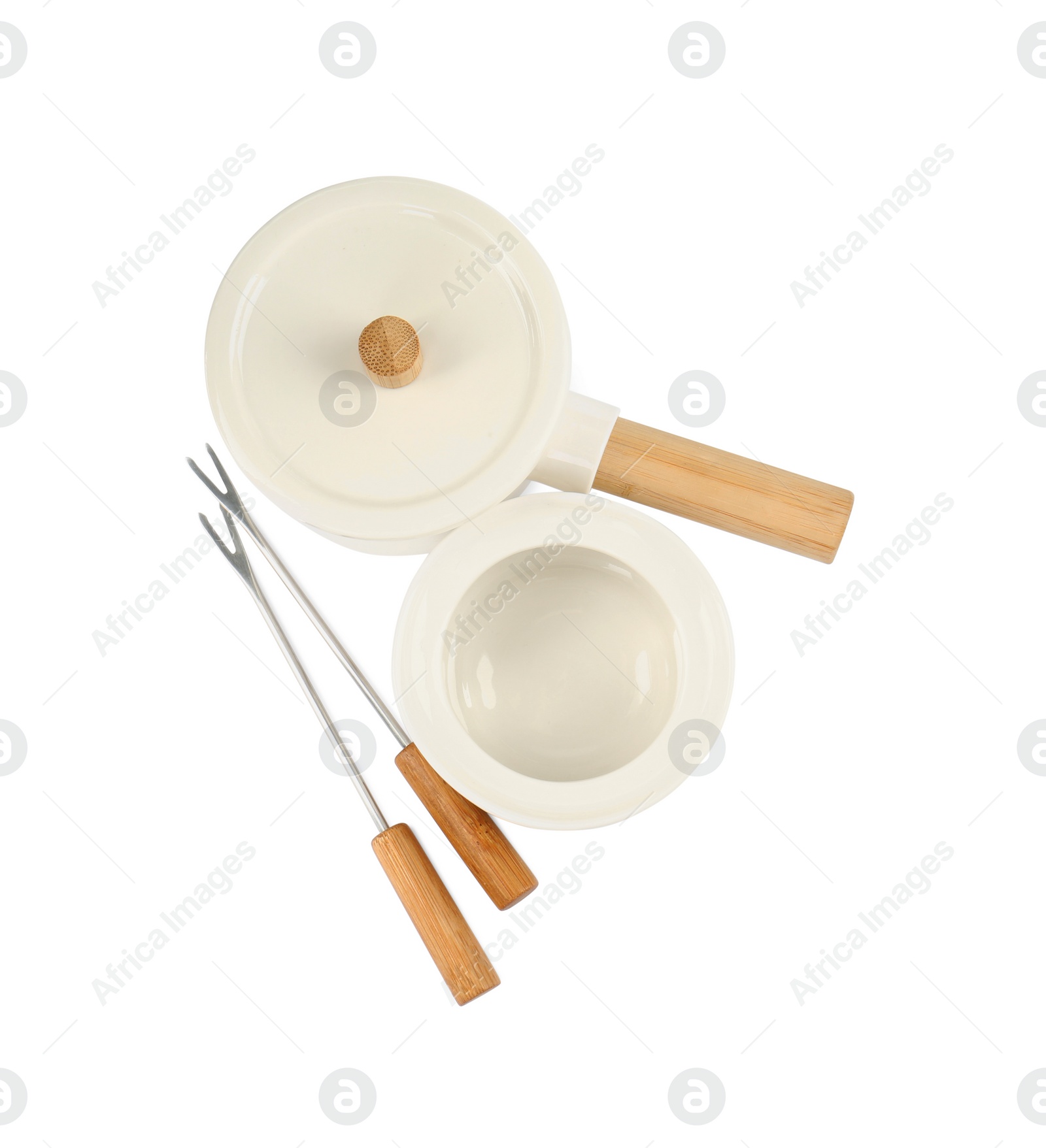 Photo of Fondue set isolated on white, top view. Kitchen equipment