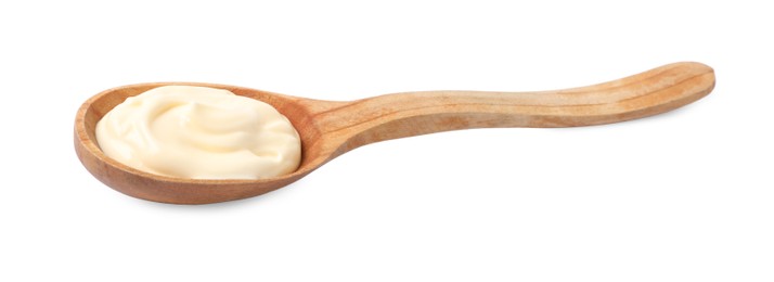 Photo of Mayonnaise in wooden spoon isolated on white