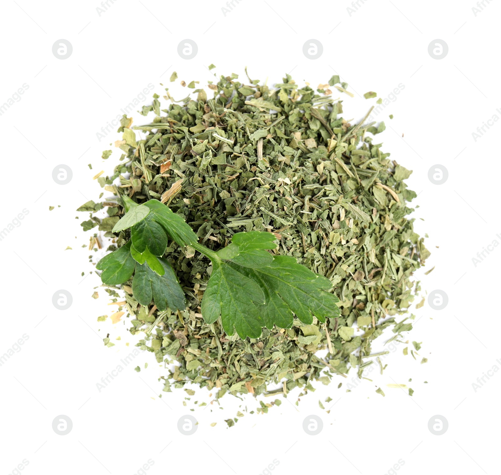 Photo of Heap of dried parsley and fresh twig on white background, top view