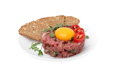 Photo of Tasty beef steak tartare served with yolk, pepper, bread and greens isolated on white