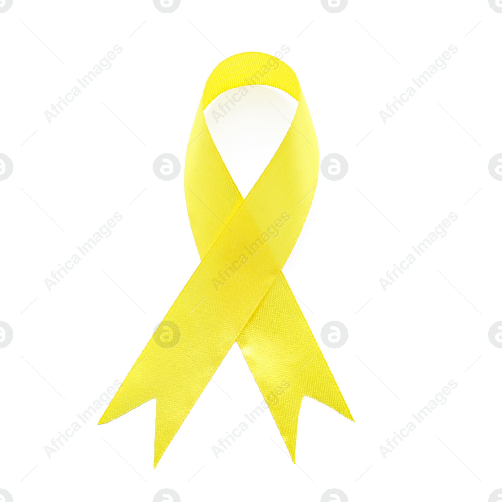 Photo of Yellow ribbon isolated on white, top view