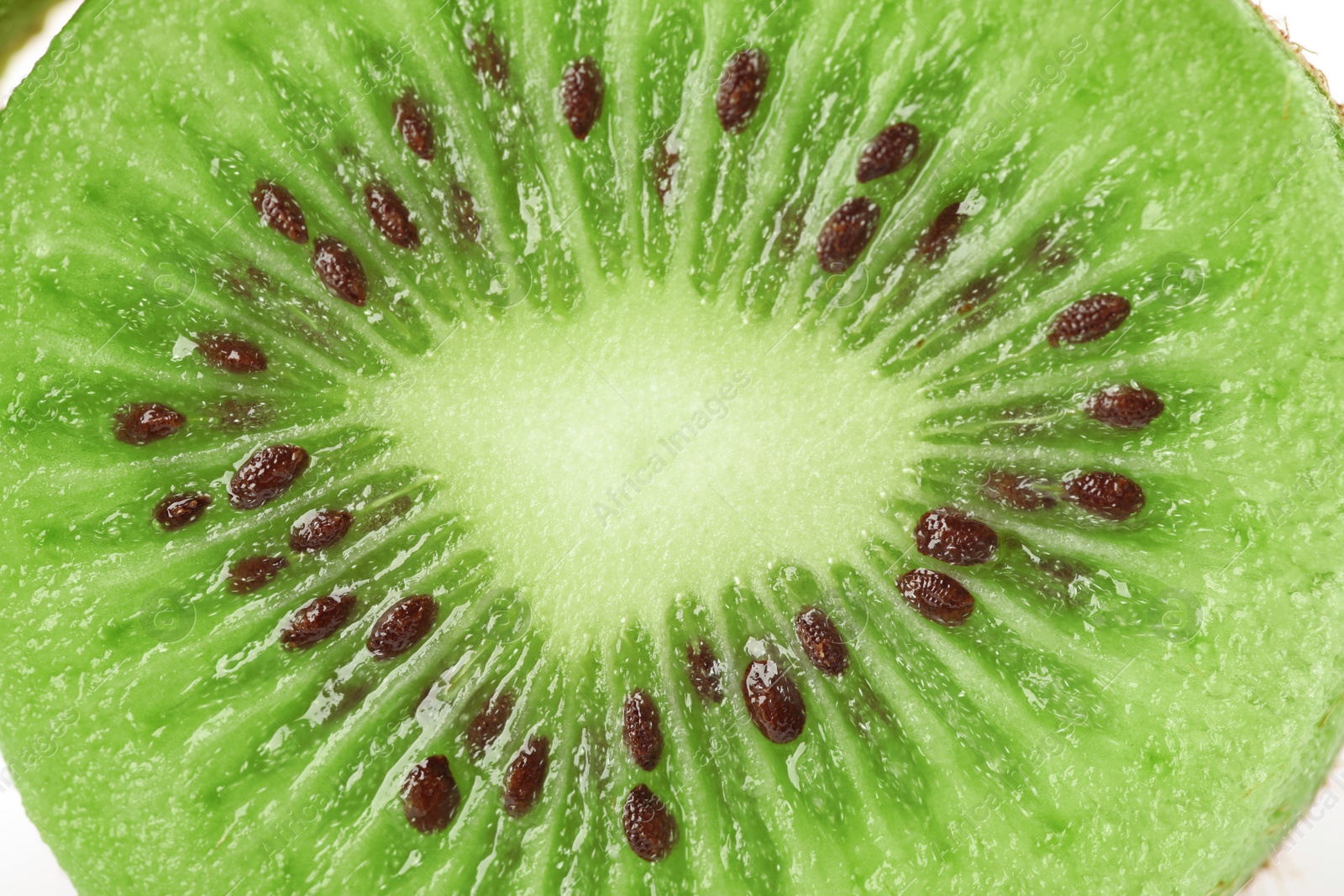 Photo of Fresh cut ripe kiwi as background, top view