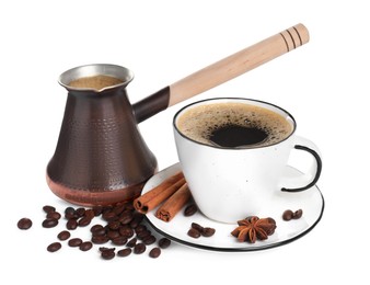 Metal turkish coffee pot with hot drink, beans and spices on white background