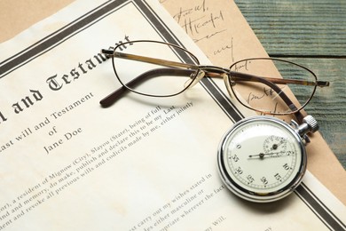 Photo of Last Will and Testament, pocket watch and glasses on rustic wooden table, closeup