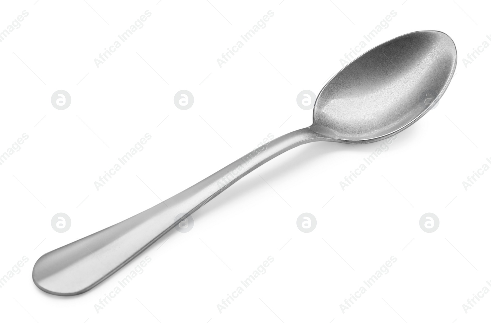 Photo of New clean shiny spoon isolated on white