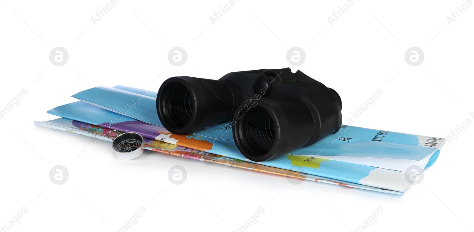 Photo of Modern binoculars, compass and map on white background