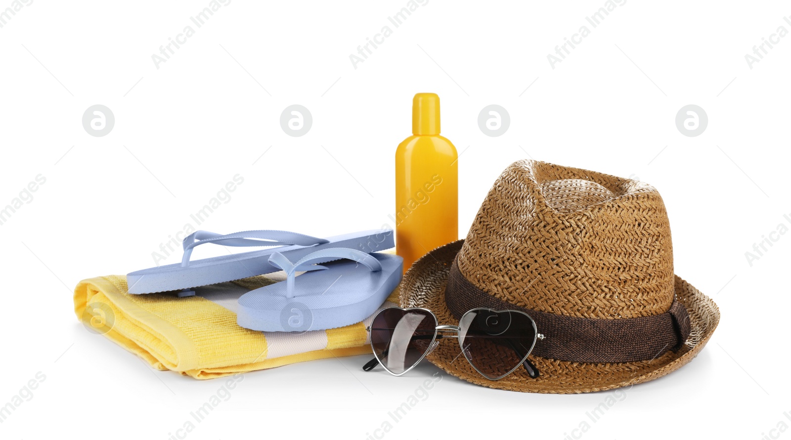 Photo of Different stylish beach accessories on white background