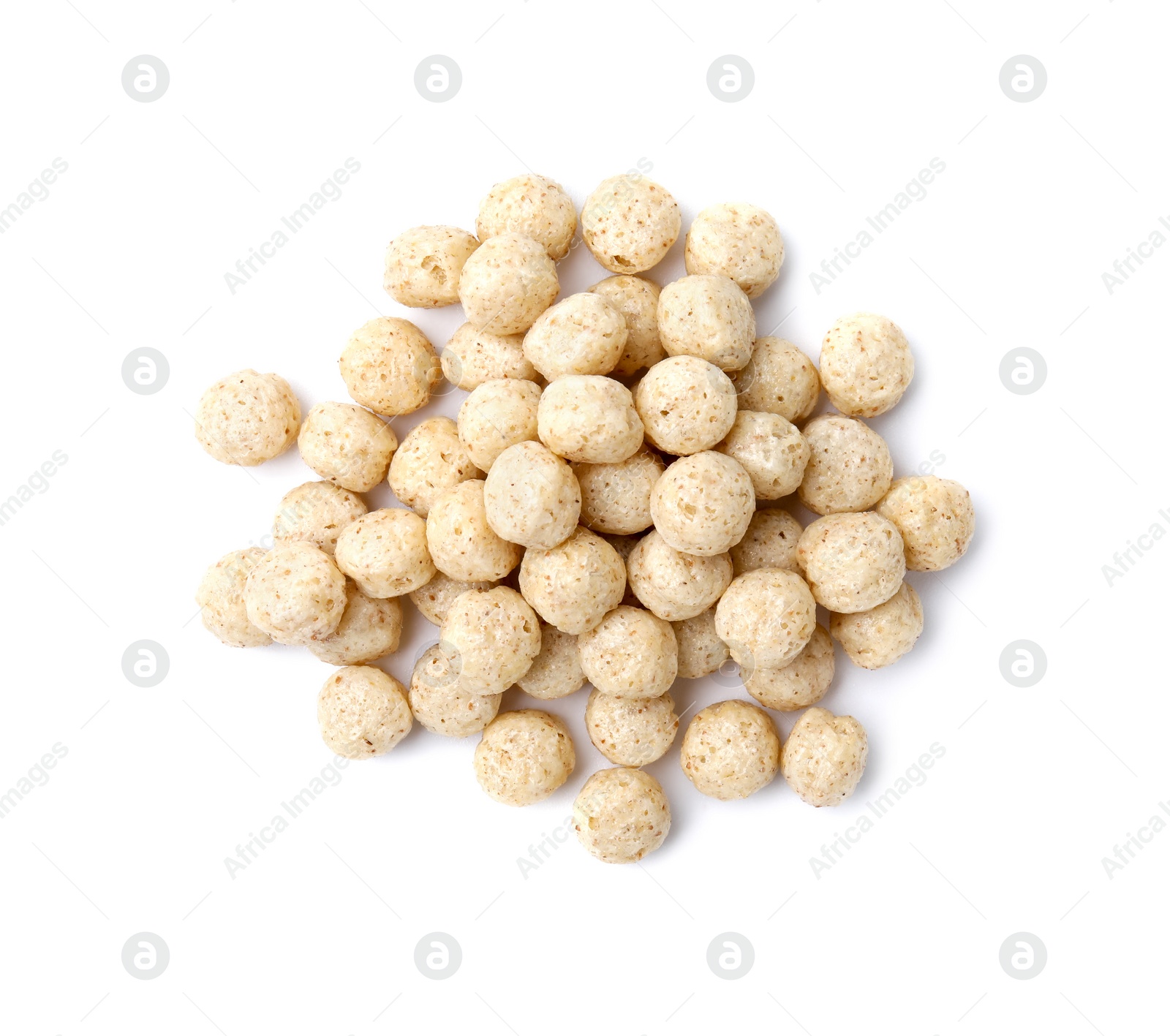 Photo of Tasty cereal balls isolated on white, top view