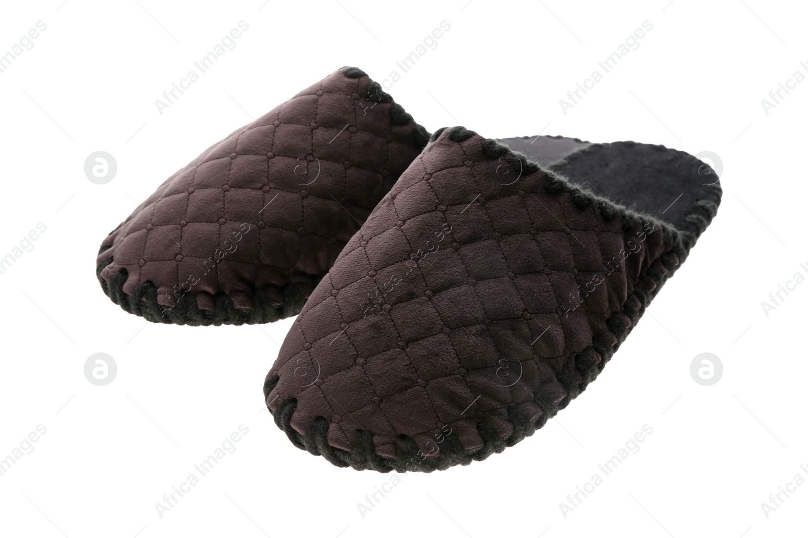 Photo of Pair of soft closed toe slippers on white background