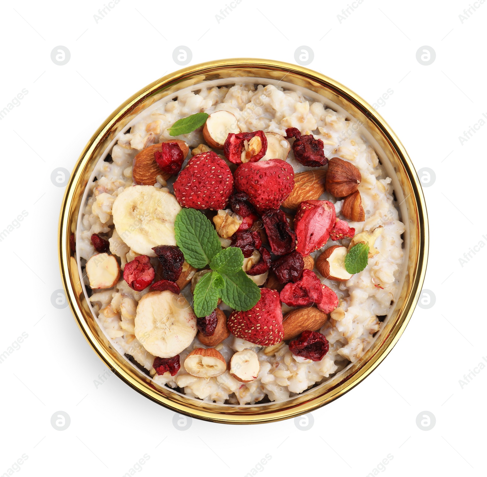 Photo of Delicious oatmeal with freeze dried berries, banana, nuts and mint on white background, top view