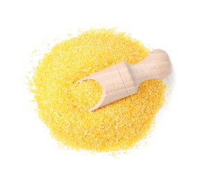 Pile of raw cornmeal and scoop isolated on white, top view