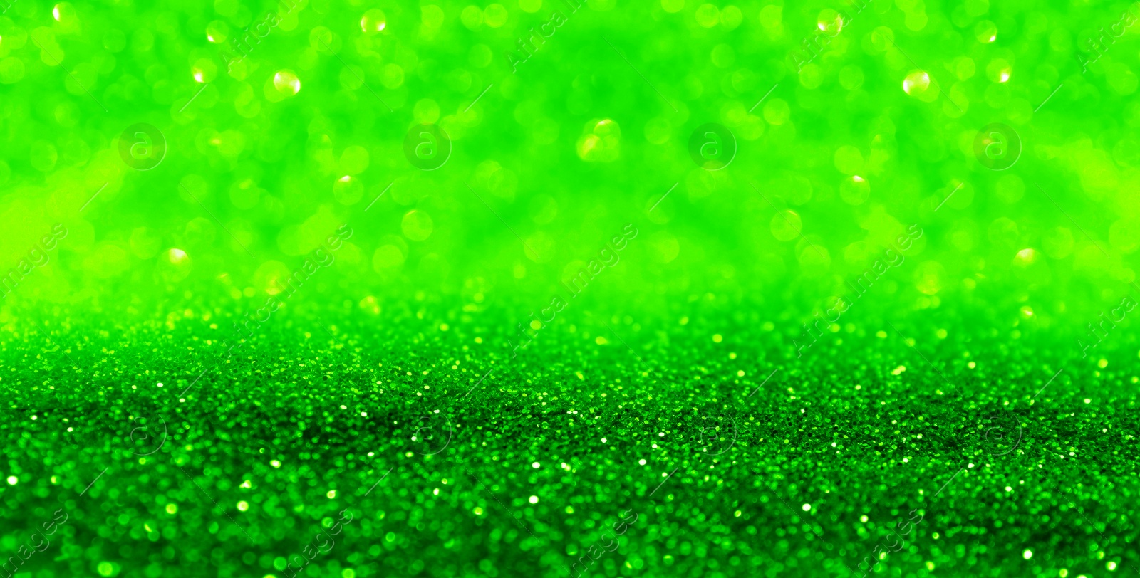 Image of St. Patrick day. Shiny green glitter, bokeh effect. Banner design