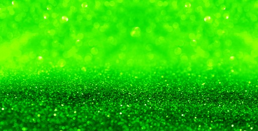 Image of St. Patrick day. Shiny green glitter, bokeh effect. Banner design