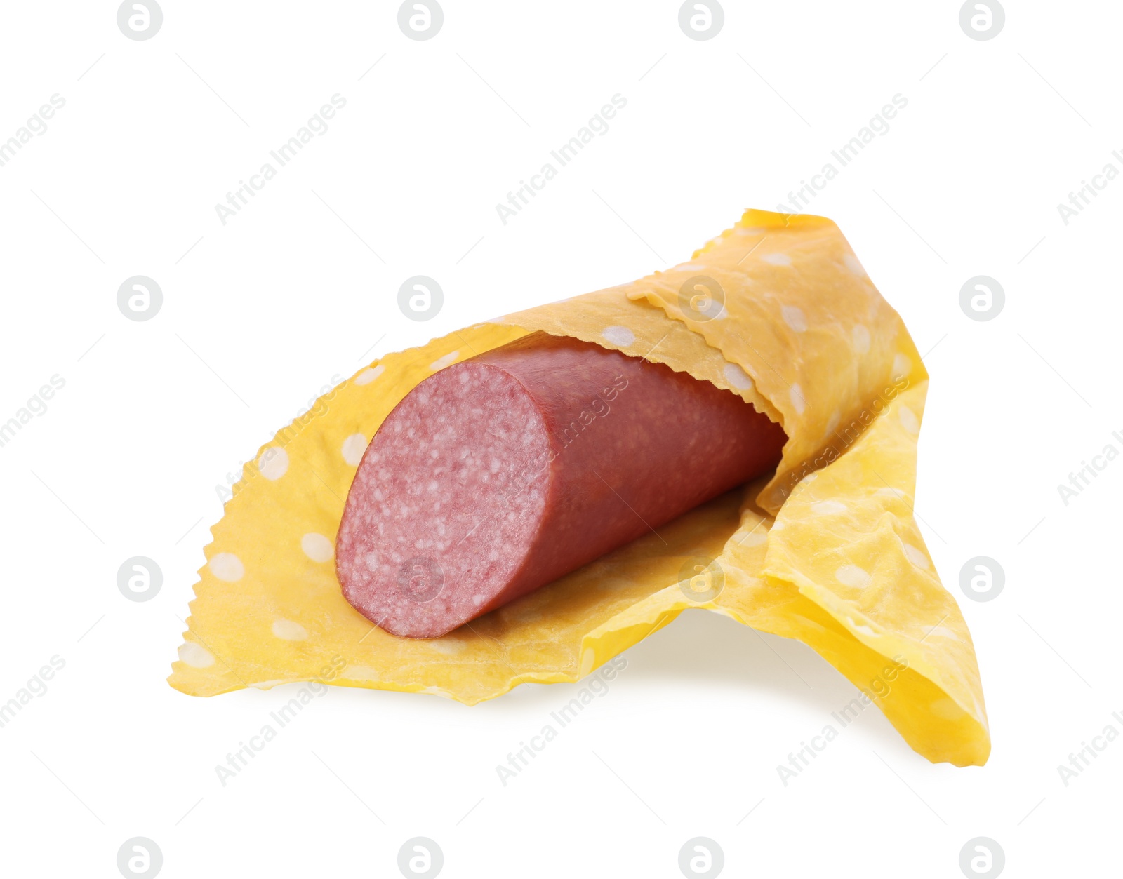 Photo of Fresh tasty sausage in beeswax food wrap isolated on white