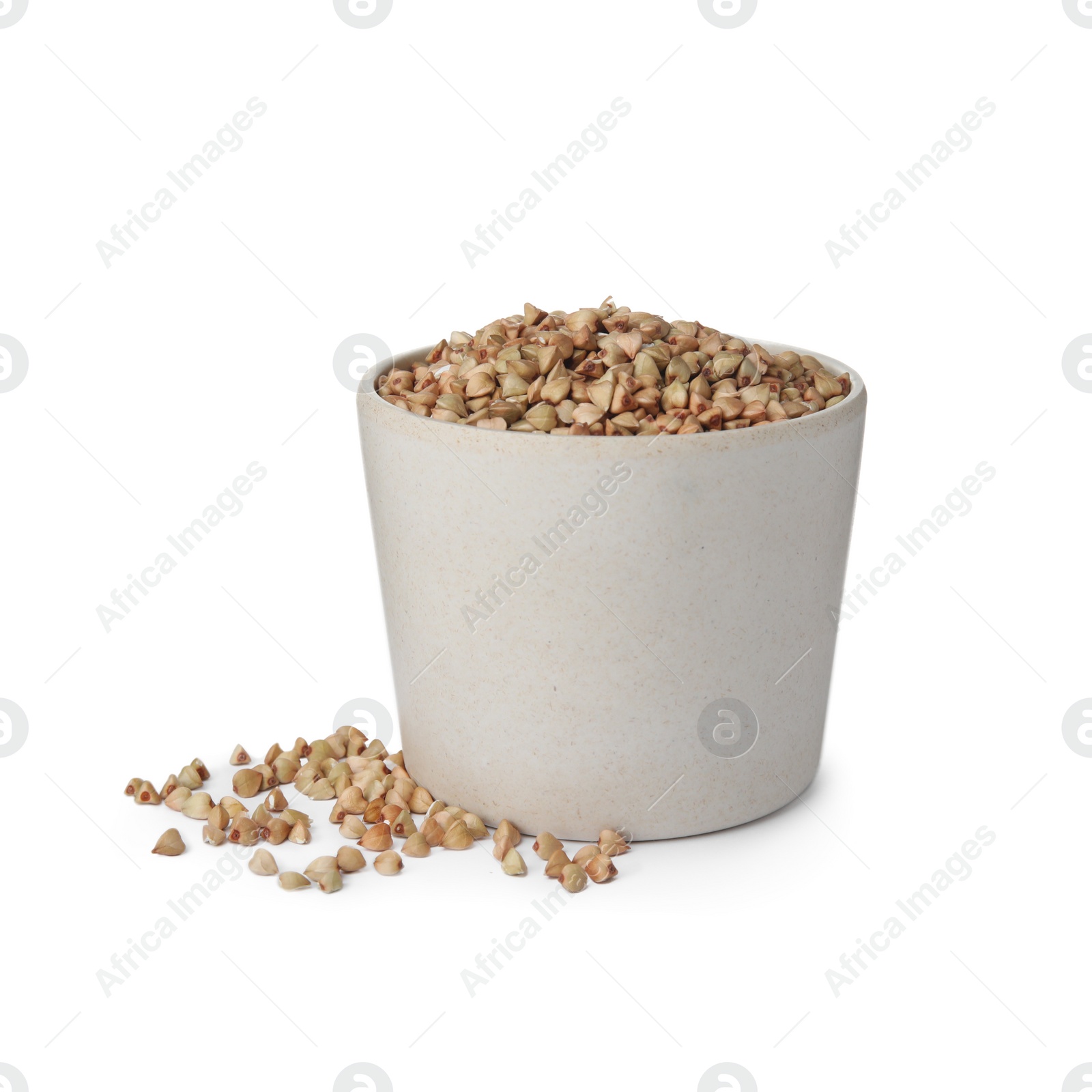 Photo of Organic green buckwheat in bowl isolated on white