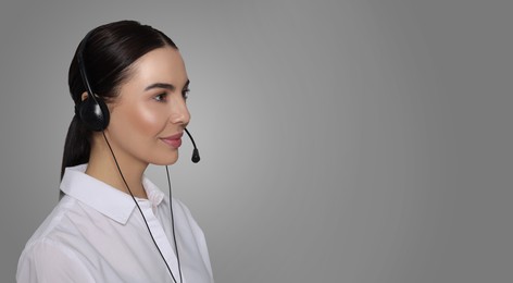 Hotline operator with headset on light grey background, space for text. Banner design