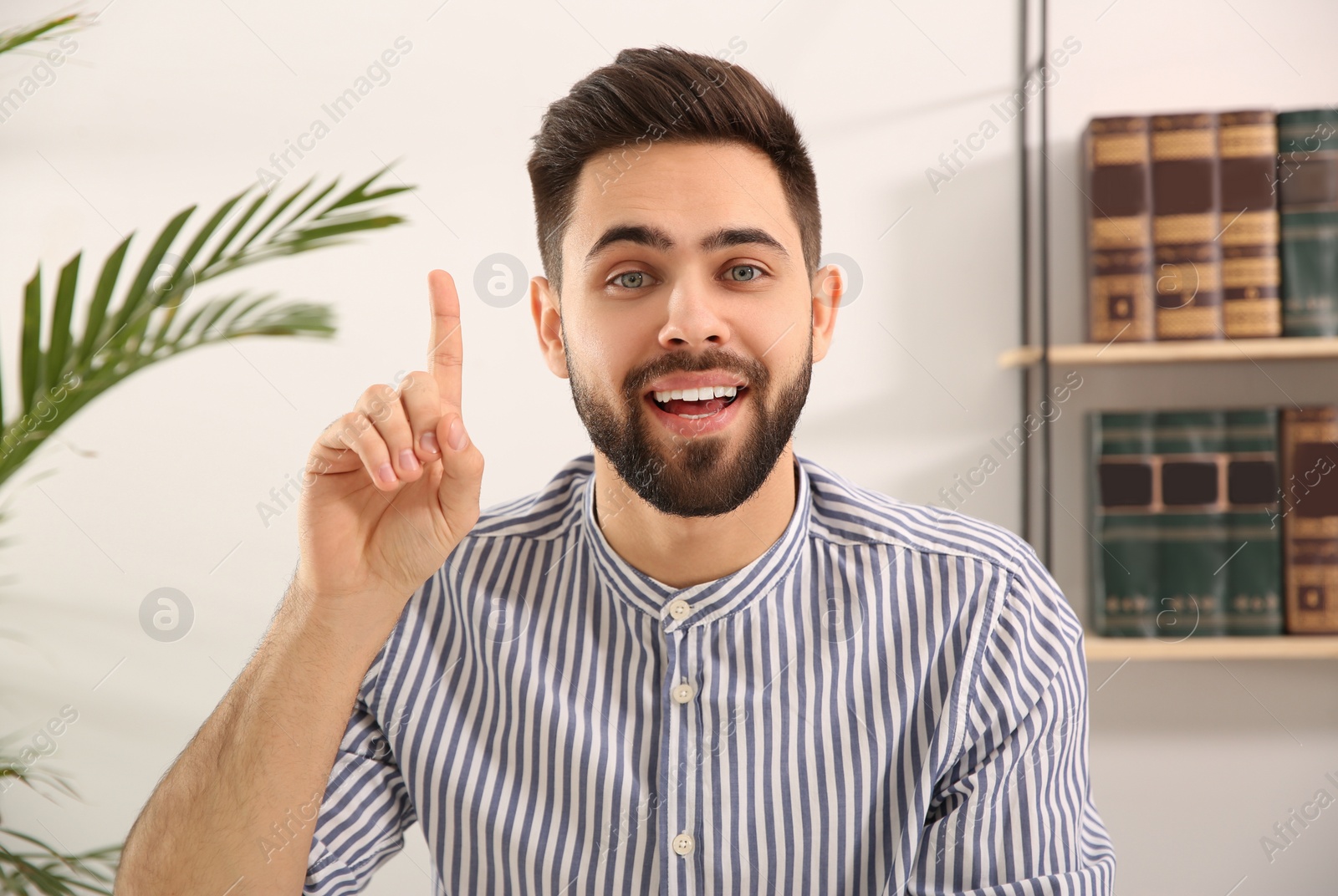 Photo of Young man using video chat at home, view from web camera