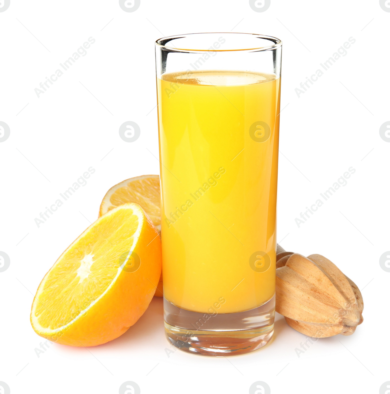 Photo of Cut ripe orange, glass of fresh juice and reamer on white background