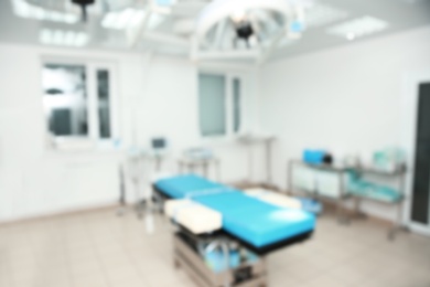 Photo of Blurred view of surgery room in modern clinic