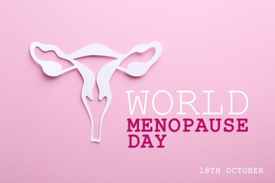 World Menopause Day - October, 18. Paper uterus on pink background, top view