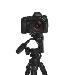 Modern tripod with professional camera isolated on white