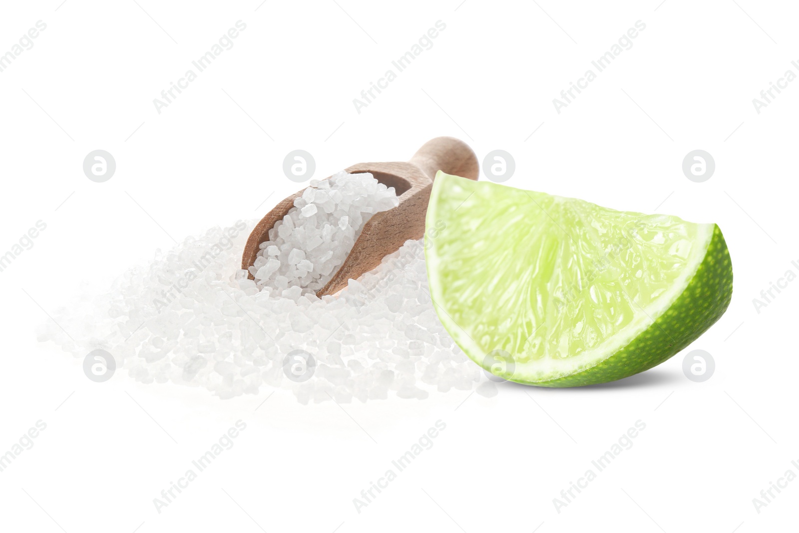 Image of Cut lime and salt isolated on white. Margarita cocktail ingredients