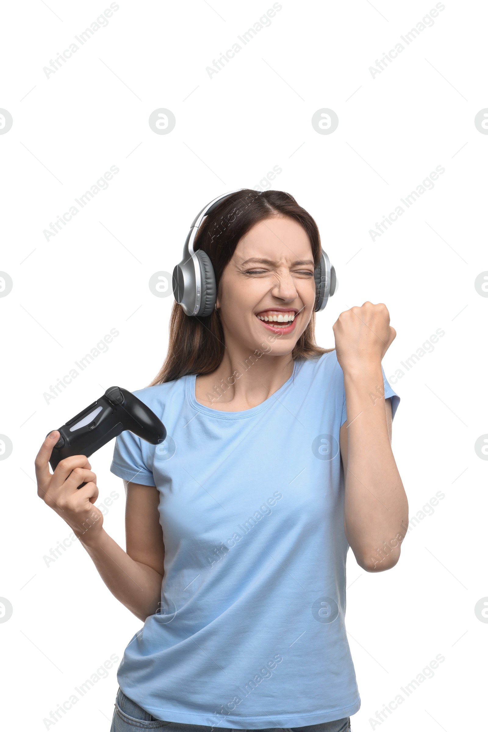 Photo of Happy woman in headphones with game controller on white background