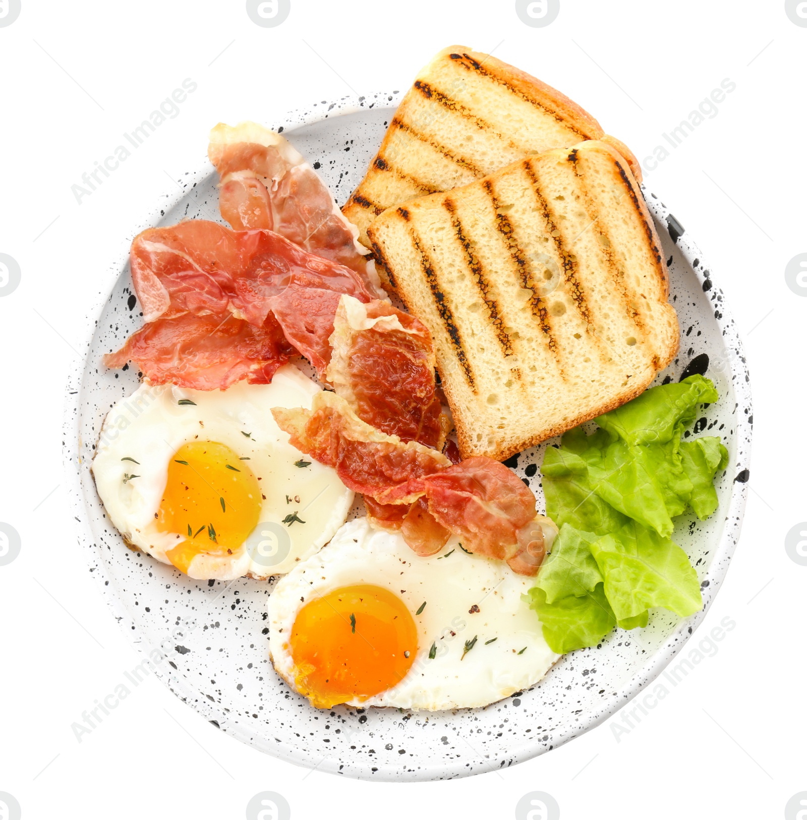 Photo of Plate with fried eggs, bacon, toasts and lettuce on white background