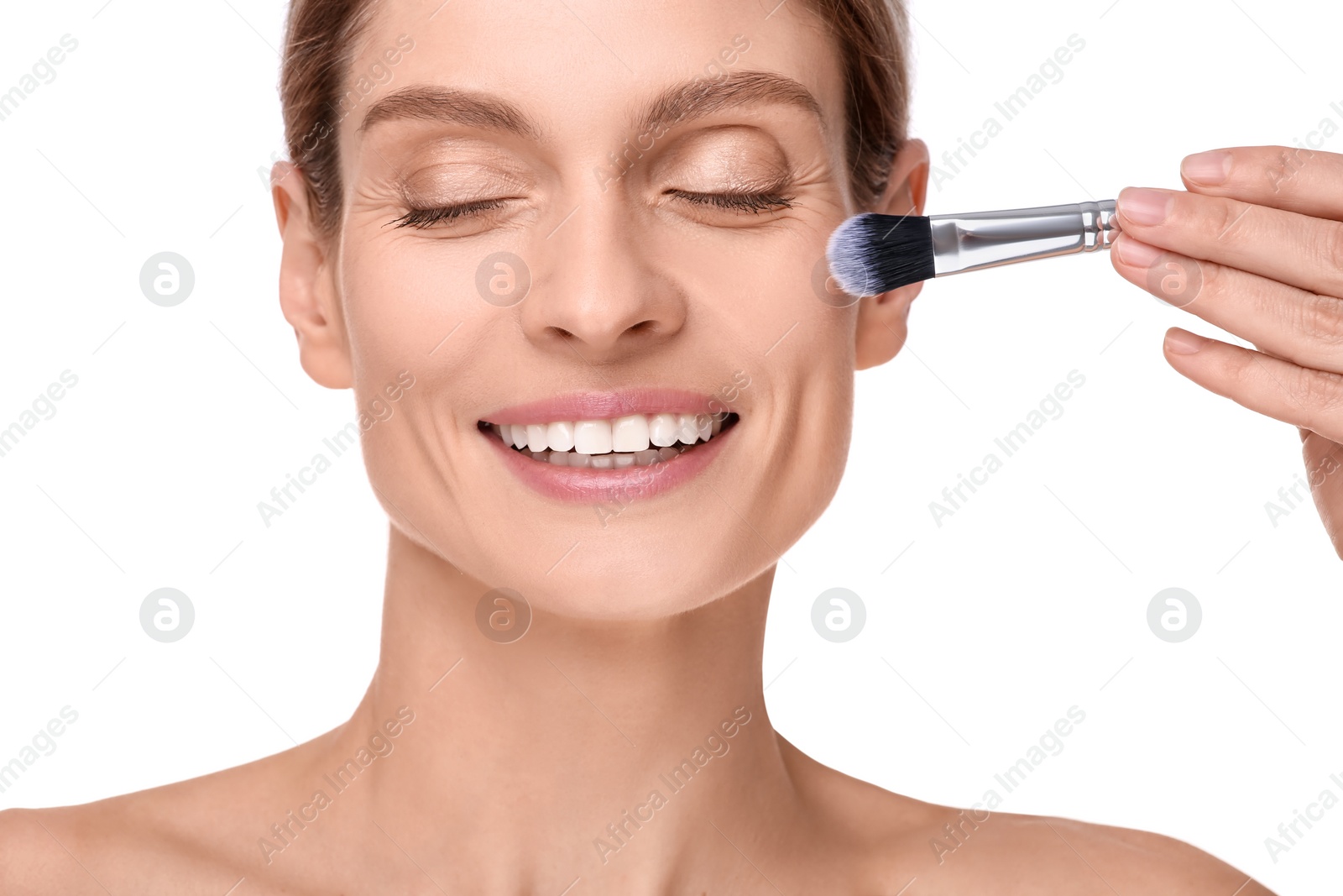 Photo of Woman with makeup brush on white background