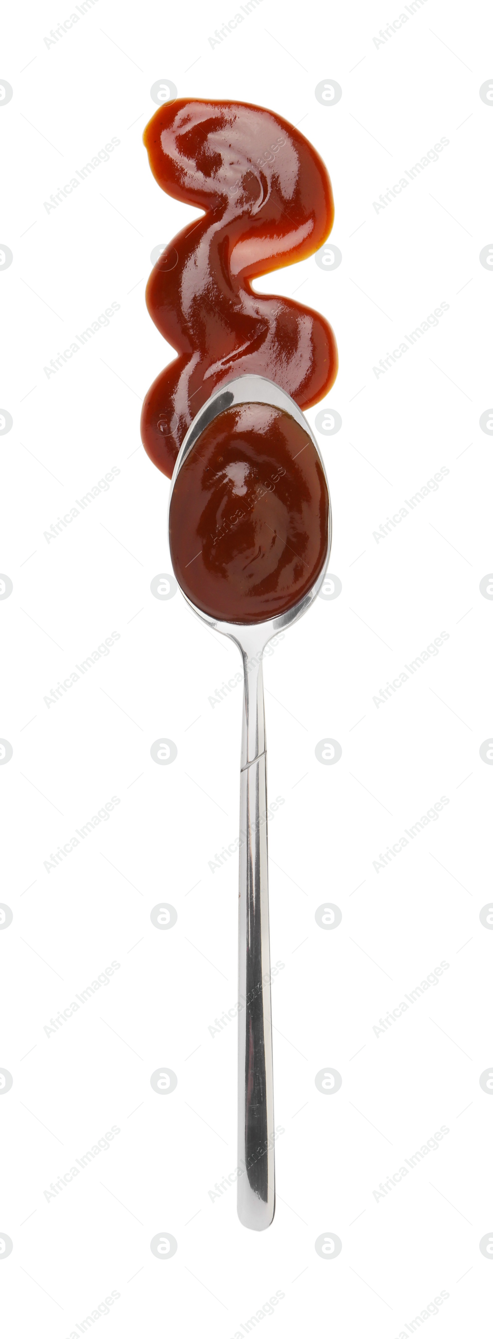 Photo of Tasty barbecue sauce and spoon isolated on white, top view