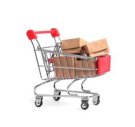 Photo of Small metal shopping cart with boxes isolated on white