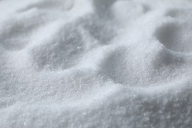 Organic white sea salt as background, closeup